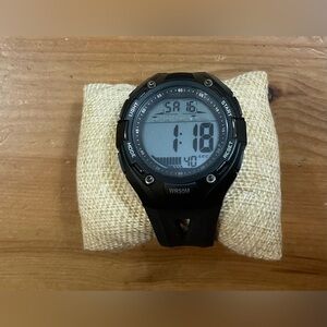 Brigadeon: BTW1801/ 5ATM Men’s black digital adjustable plastic wrist watch.